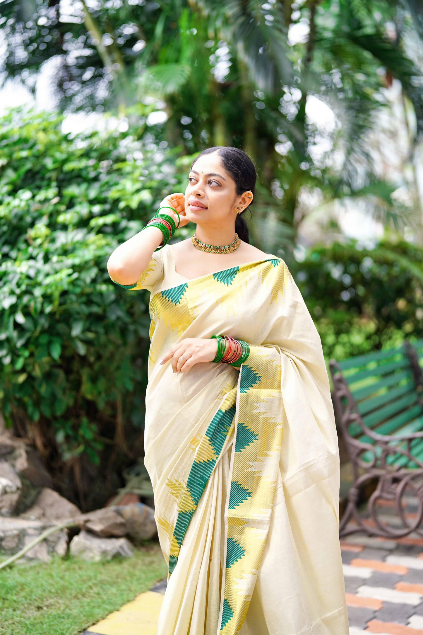 Temple golden tissue saree bottle green