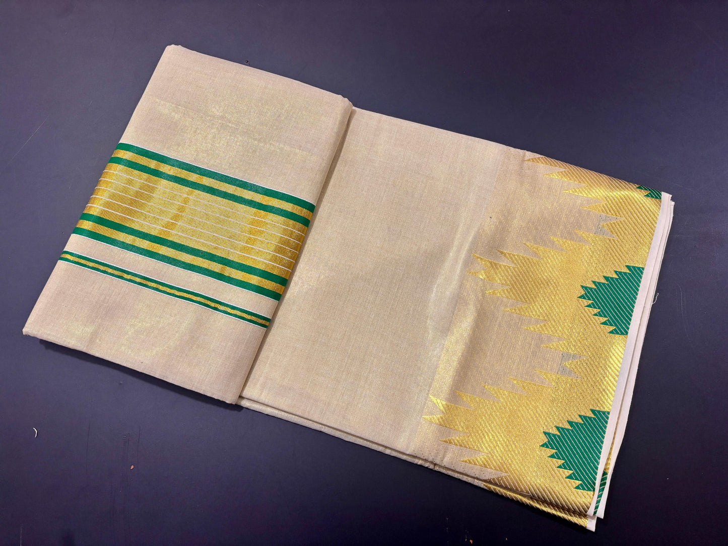 Temple golden tissue saree bottle green